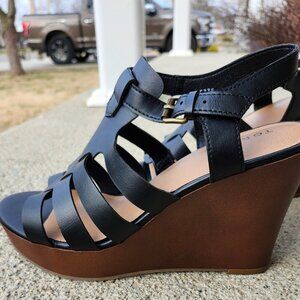 Torrid Size 11 Black/Brown Wedge Fisherman Sandals. 4 1/2" Heel. New/Tiny flaws.